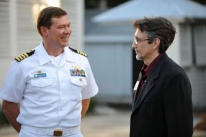 Commanding officer of Naval Air Station Key West, Capt. Steven Holmes, with Clifton.