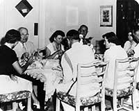 Post presidential visit in 1957 with RADM Francis McCorkle entertaining the former president