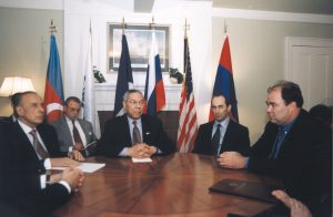 President Truman giving executive orders at table