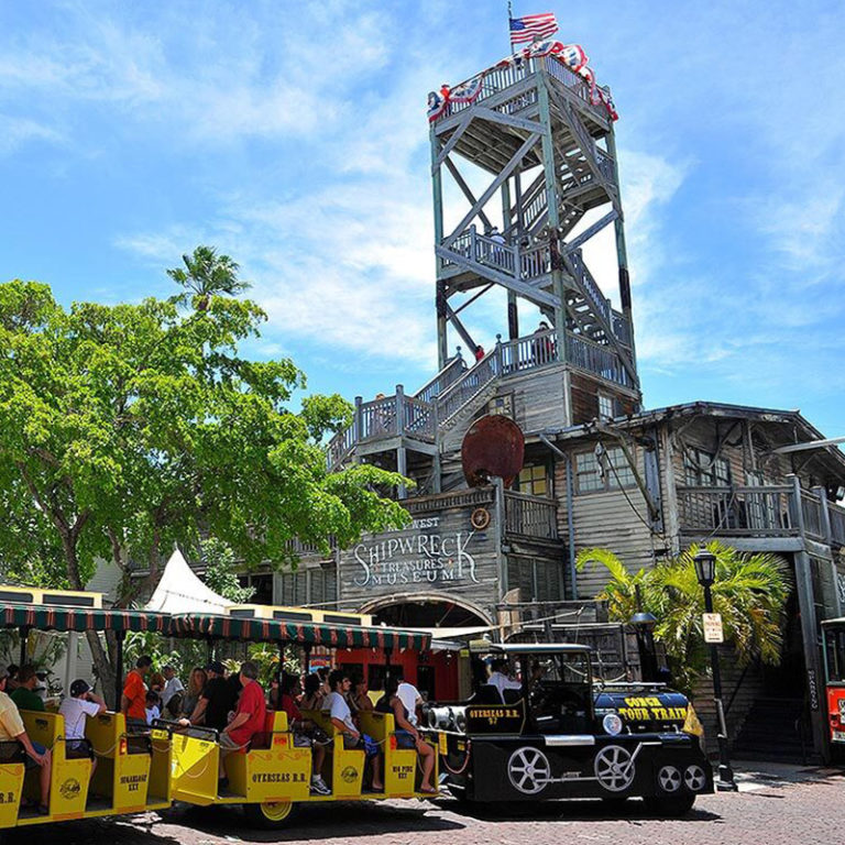 conch tour train infront of the key west shipwreck museum